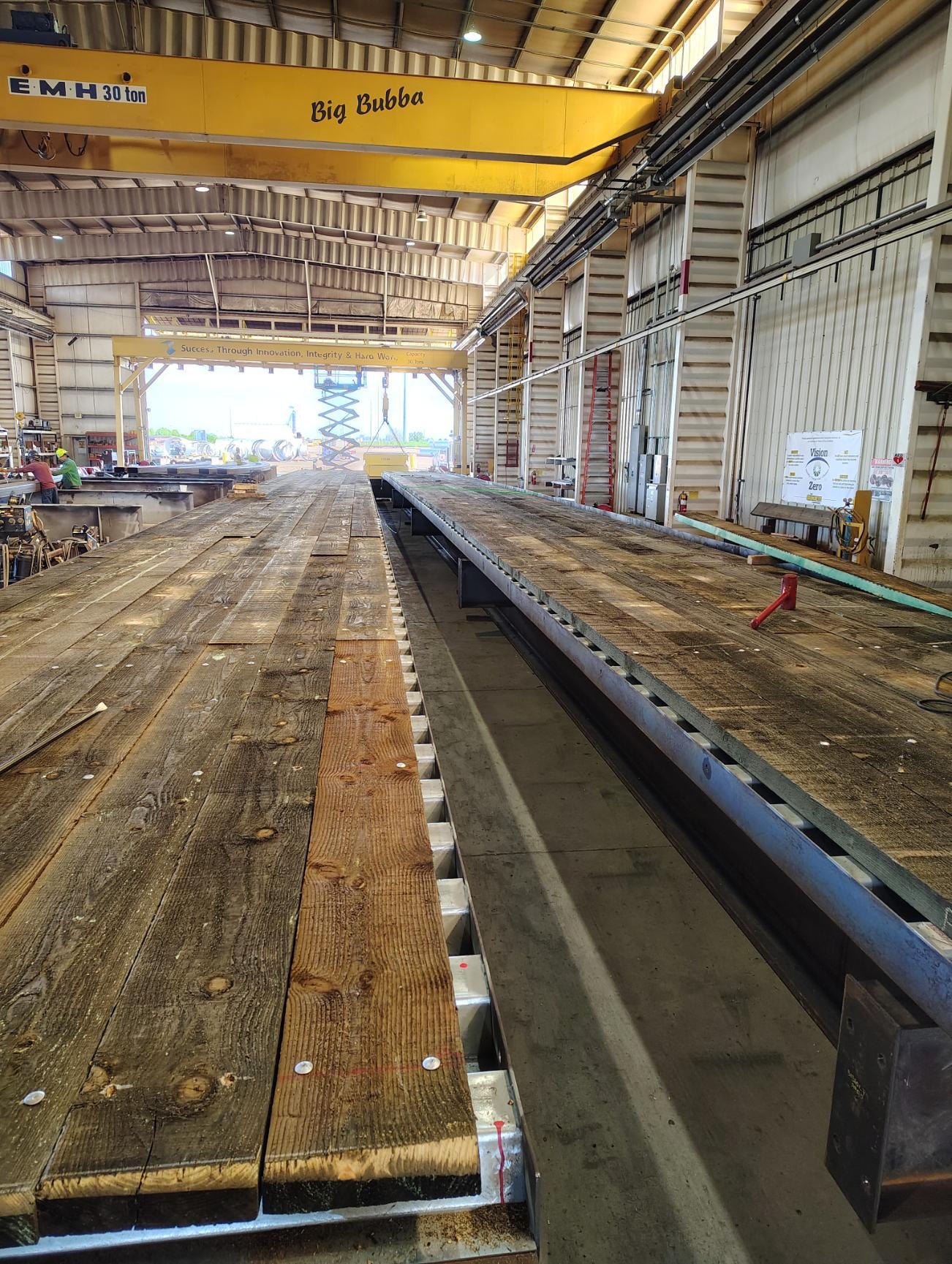 Timber deck laid on a steel bridge beam in the shop